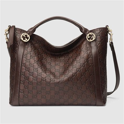 gucci purse brown with gucci lables|Gucci purse brown leather.